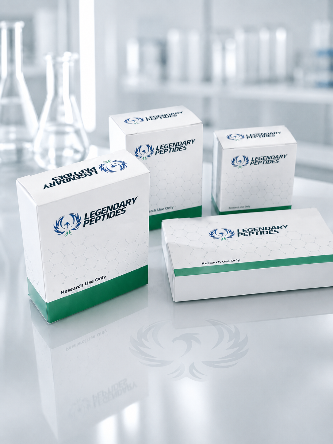 Legendary Peptides premium branded product packaging displayed in a clean clinical laboratory setting with luxury research compound shipping boxes.